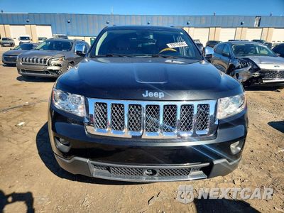 Piąte zdjęcie samochodu w środku: 2013 JEEP GRAND CHEROKEE OVERLAND VIN:1C4RJFCTXDC581573 - miniatura