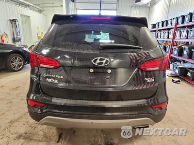 Zdjęcie 6 z 13 samochodu: 2018 HYUNDAI SANTA FE SPORT 2.4L VIN:5NMZTDLBXJH079438 - miniatura