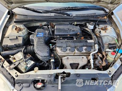 Zdjęcie 11 z 12 samochodu: 2005 HONDA CIVIC DX VP VIN:1HGEM22195L014207 - miniatura