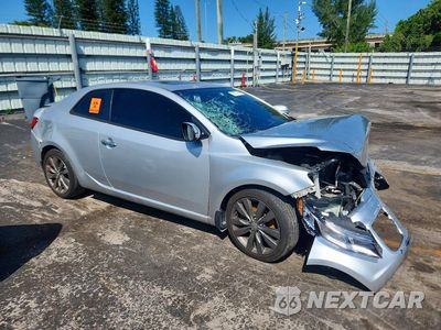 Czwarte zdjęcie samochodu z boku: 2013 KIA FORTE KOUP SX VIN:KNAFW6A38D5740048 - miniatura