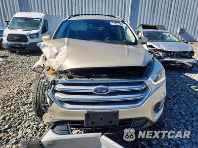 Piąte zdjęcie samochodu w środku: 2017 FORD ESCAPE TITANIUM VIN:1FMCU9J96HUF00943 - miniatura