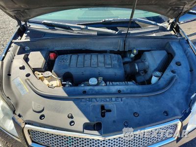 Zdjęcie 12 z 13 samochodu: 2010 CHEVROLET TRAVERSE LTZ VIN:1GNLRHED3AS117615 - miniatura