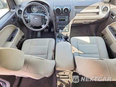 Zdjęcie 8 z 13 samochodu: 2008 FORD TAURUS X SEL VIN:1FMDK02W28GA01906 - miniatura