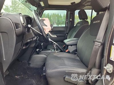 Zdjęcie 7 z 13 samochodu: 2017 JEEP WRANGLER UNLIMITED SAHARA VIN:1C4HJWEG3HL576782 - miniatura