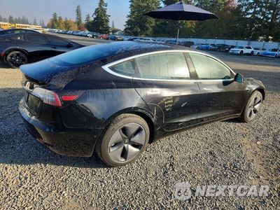 Trzecie zdjęcie samochodu z tyłu: 2019 TESLA MODEL 3 VIN:5YJ3E1EA1KF297094 - miniatura