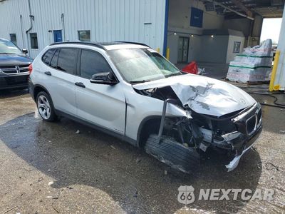 Czwarte zdjęcie samochodu z boku: 2014 BMW X1 SDRIVE28I VIN:WBAVM1C5XEVW51733 - miniatura