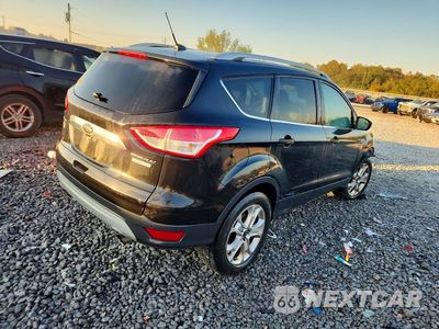 Trzecie zdjęcie samochodu z tyłu: 2014 FORD ESCAPE TITANIUM VIN:1FMCU0J94EUC61738 - miniatura