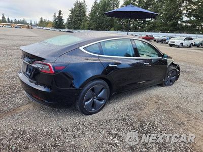 Trzecie zdjęcie samochodu z tyłu: 2019 TESLA MODEL 3 VIN:5YJ3E1EA0KF425728 - miniatura