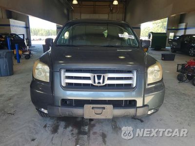 Piąte zdjęcie samochodu w środku: 2006 HONDA PILOT EX VIN:2HKYF18466H563967 - miniatura