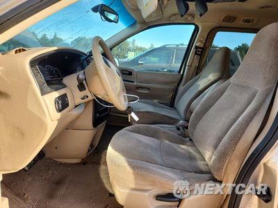 Zdjęcie 7 z 13 samochodu: 2003 FORD WINDSTAR LX VIN:2FMZA51403BA52908 - miniatura