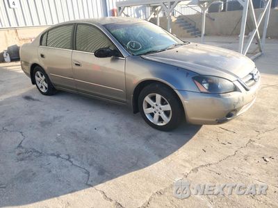 Czwarte zdjęcie samochodu z boku: 2002 NISSAN ALTIMA 2.5 VIN:1N4AL11D32C237169 - miniatura