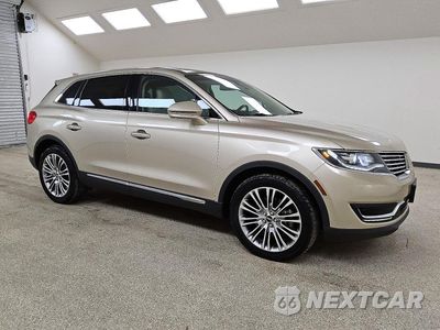 Czwarte zdjęcie samochodu z boku: 2017 LINCOLN MKX RESERVE VIN:2LMPJ8LR3HBL24459 - miniatura