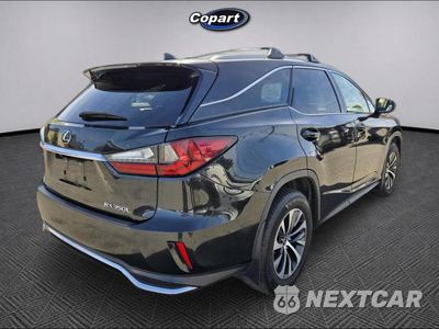 Czwarte zdjęcie samochodu z boku: 2021 LEXUS RX 350L BASE VIN:JTJAZKFA5M2027952 - miniatura