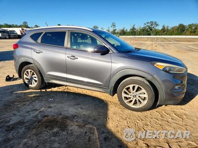 Czwarte zdjęcie samochodu z boku: 2016 HYUNDAI TUCSON SE VIN:KM8J33A41GU204464 - miniatura