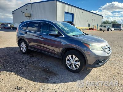 Czwarte zdjęcie samochodu z boku: 2014 HONDA CR-V EXL VIN:2HKRM3H71EH541809 - miniatura