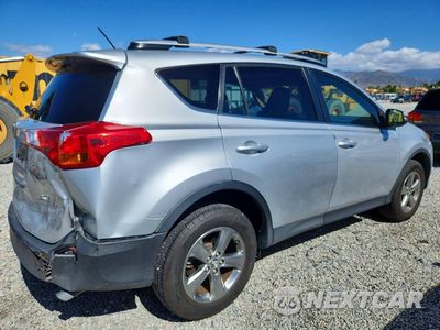 Trzecie zdjęcie samochodu z tyłu: 2015 TOYOTA RAV4 XLE VIN:JTMWFREV0FD065885 - miniatura