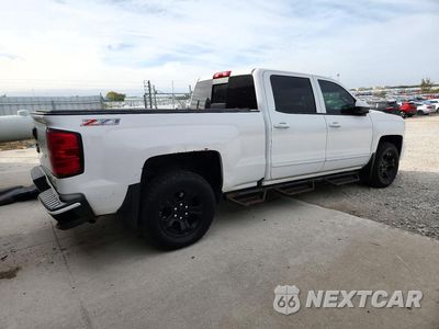 Trzecie zdjęcie samochodu z tyłu: 2016 CHEVROLET SILVERADO K1500 LT VIN:3GCUKREC5GG294505 - miniatura