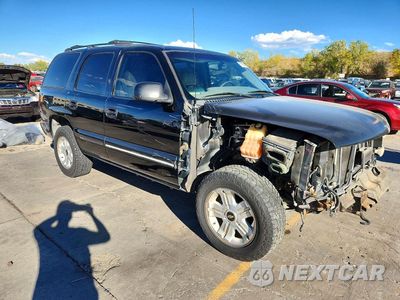 Czwarte zdjęcie samochodu z boku: 2001 CHEVROLET TAHOE K1500 VIN:1GNEK13T01R124060 - miniatura