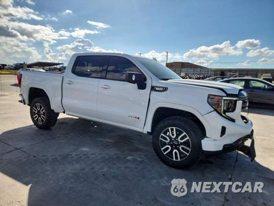 Czwarte zdjęcie samochodu z boku: 2023 GMC SIERRA K1500 AT4 VIN:1GTUUEE82PZ319679 - miniatura