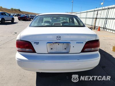 Zdjęcie 6 z 13 samochodu: 1998 MAZDA 626 DX VIN:1YVGF22C4W5735957 - miniatura