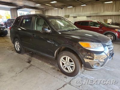 Czwarte zdjęcie samochodu z boku: 2012 HYUNDAI SANTA FE GLS VIN:5XYZGDAB2CG160700 - miniatura