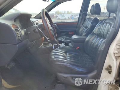 Zdjęcie 7 z 12 samochodu: 1999 JEEP GRAND CHEROKEE VIN:1J4GW68N6XC638966 - miniatura