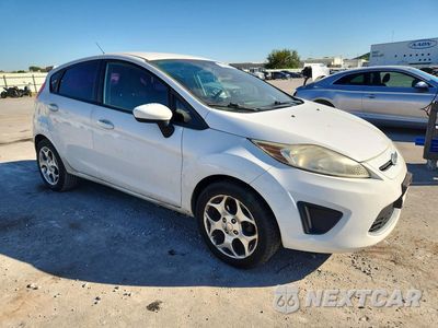 Czwarte zdjęcie samochodu z boku: 2011 FORD FIESTA SE VIN:3FADP4EJ8BM162325 - miniatura
