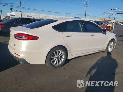 Trzecie zdjęcie samochodu z tyłu: 2019 FORD FUSION SE VIN:3FA6P0HDXKR173756 - miniatura