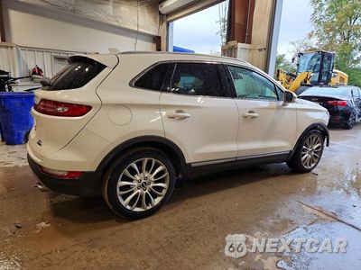Trzecie zdjęcie samochodu z tyłu: 2015 LINCOLN MKC VIN:5LMCJ1A95FUJ02515 - miniatura
