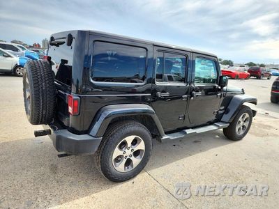 Trzecie zdjęcie samochodu z tyłu: 2016 JEEP WRANGLER UNLIMITED SAHARA VIN:1C4BJWEGXGL114479 - miniatura
