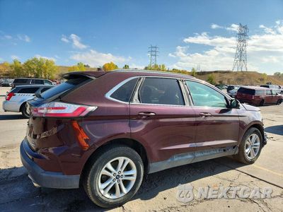 Trzecie zdjęcie samochodu z tyłu: 2019 FORD EDGE SEL VIN:2FMPK4J93KBC24440 - miniatura