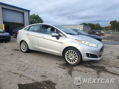 Czwarte zdjęcie samochodu z boku: 2014 FORD FIESTA TITANIUM VIN:3FADP4CJ3EM194879 - miniatura