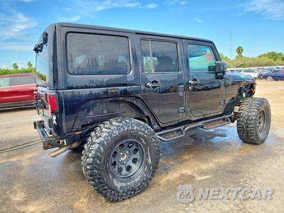 Trzecie zdjęcie samochodu z tyłu: 2015 JEEP WRANGLER UNLIMITED SAHARA VIN:1C4HJWEG2FL770233 - miniatura