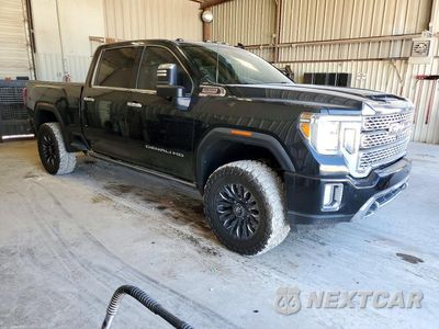 Czwarte zdjęcie samochodu z boku: 2022 GMC SIERRA K2500 DENALI VIN:1GT49REY7NF123440 - miniatura