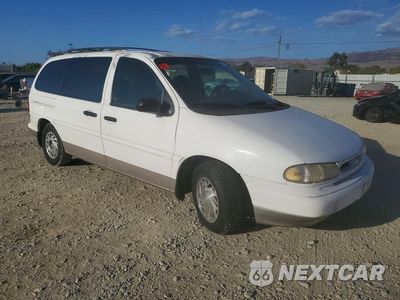 Czwarte zdjęcie samochodu z boku: 1996 FORD WINDSTAR WAGON VIN:2FMDA5147TBC72900 - miniatura