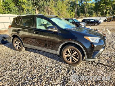 Czwarte zdjęcie samochodu z boku: 2016 TOYOTA RAV4 XLE VIN:2T3WFREV7GW250083 - miniatura