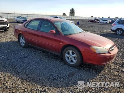 Czwarte zdjęcie samochodu z boku: 2000 FORD TAURUS SES VIN:1FAFP5525YG200345 - miniatura