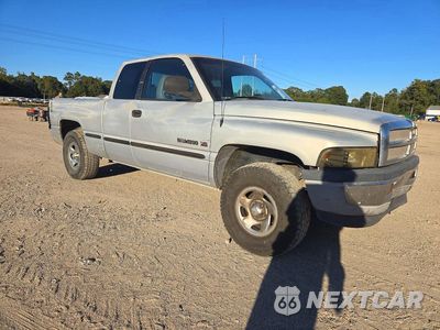 Czwarte zdjęcie samochodu z boku: 1999 DODGE RAM 1500 VIN:3B7HC12Y7XG216906 - miniatura