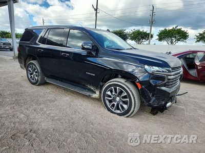 Czwarte zdjęcie samochodu z boku: 2022 CHEVROLET TAHOE C1500 LT VIN:1GNSCNKD7NR331729 - miniatura
