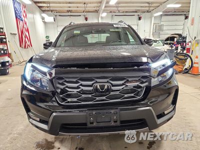Piąte zdjęcie samochodu w środku: 2023 HONDA PASSPORT TRAIL SPORT VIN:5FNYF8H60PB023556 - miniatura