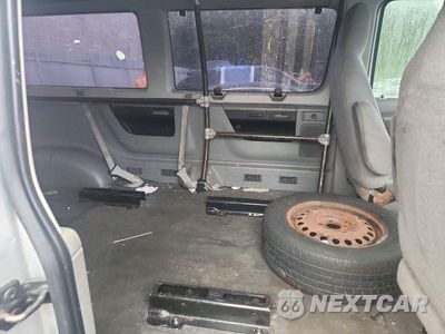 Zdjęcie 11 z 13 samochodu: 2011 FORD ECONOLINE E350 SUPER DUTY WAGON VIN:1FBNE3BL6BDA30653 - miniatura