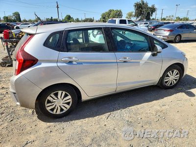 Trzecie zdjęcie samochodu z tyłu: 2015 HONDA FIT LX VIN:3HGGK5H50FM723909 - miniatura