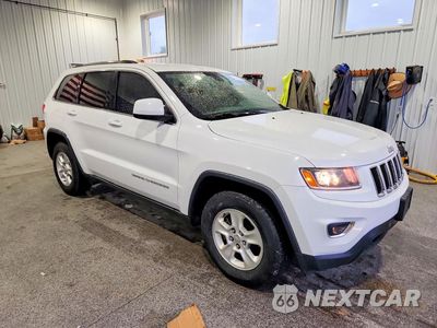 Czwarte zdjęcie samochodu z boku: 2016 JEEP GRAND CHEROKEE LAREDO VIN:1C4RJEAG0GC445747 - miniatura
