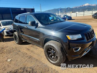 Czwarte zdjęcie samochodu z boku: 2015 JEEP GRAND CHEROKEE OVERLAND VIN:1C4RJFCM4FC747114 - miniatura
