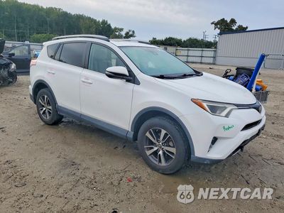Czwarte zdjęcie samochodu z boku: 2018 TOYOTA RAV4 VIN:2T3RFREV5JW753020 - miniatura