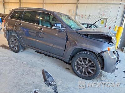 Czwarte zdjęcie samochodu z boku: 2014 JEEP GRAND CHEROKEE SUMMIT VIN:1C4RJFJG7EC329674 - miniatura