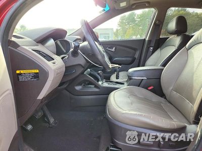 Zdjęcie 7 z 13 samochodu: 2012 HYUNDAI TUCSON LIMITED VIN:KM8JUCAC7CU381485 - miniatura