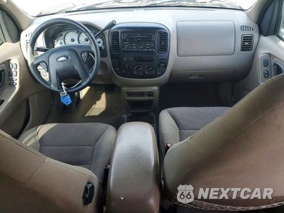 Zdjęcie 8 z 13 samochodu: 2001 FORD ESCAPE VIN:1FMCU04111KE57888 - miniatura
