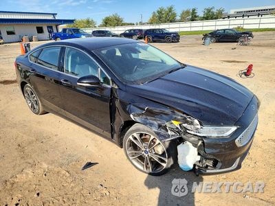 Czwarte zdjęcie samochodu z boku: 2020 FORD FUSION TITANIUM VIN:3FA6P0D97LR115977 - miniatura