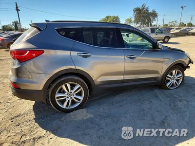 Trzecie zdjęcie samochodu z tyłu: 2014 HYUNDAI SANTA FE SPORT 2.0T VIN:5XYZUDLA9EG209407 - miniatura